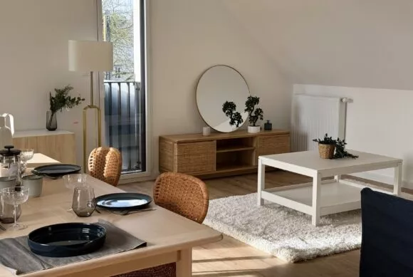 Appartement témoin de la résidence Agapanthe à Saint-Malo, salon et salle à manger. Un programme immobilier neuf réalisé par Pierre Promotion.